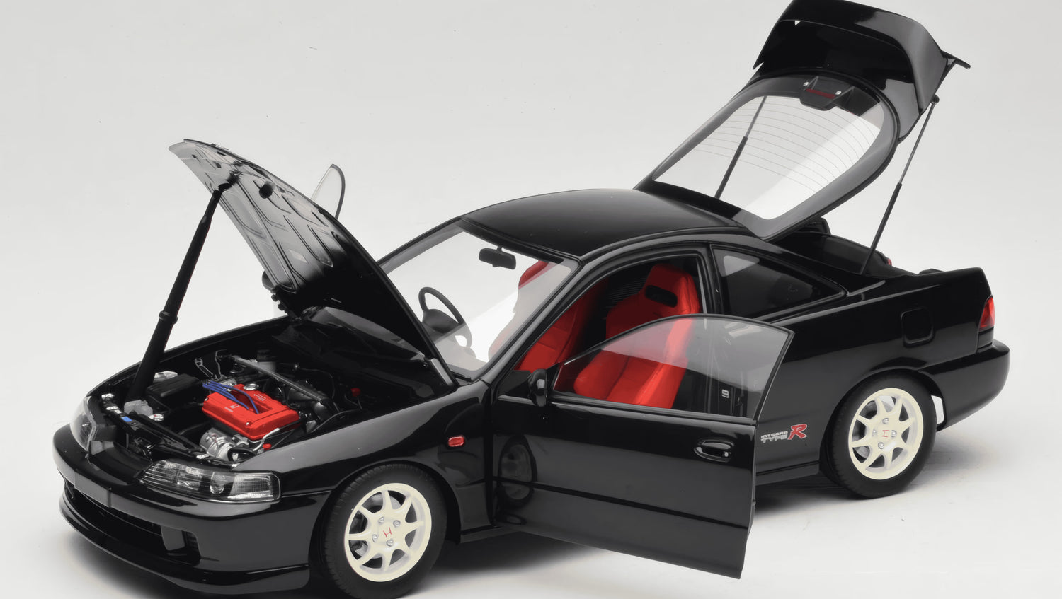 MOTORHELIX - 1/18 - HONDA - INTEGRA TYPE-R (DC2) 1997 - BLACK (M85203)