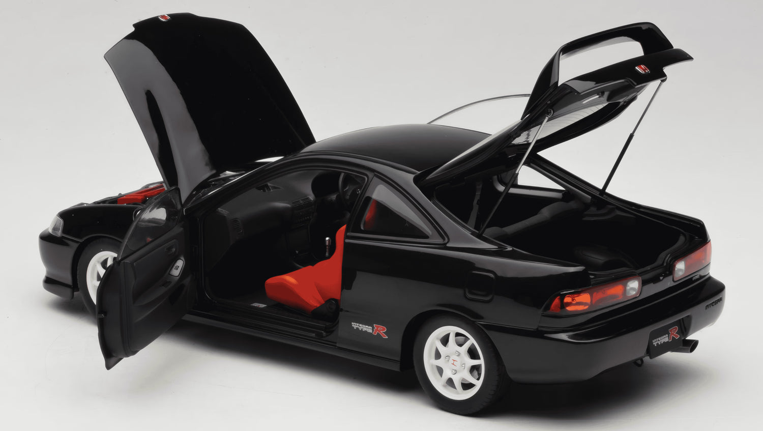 MOTORHELIX - 1/18 - HONDA - INTEGRA TYPE-R (DC2) 1997 - BLACK (M85203)